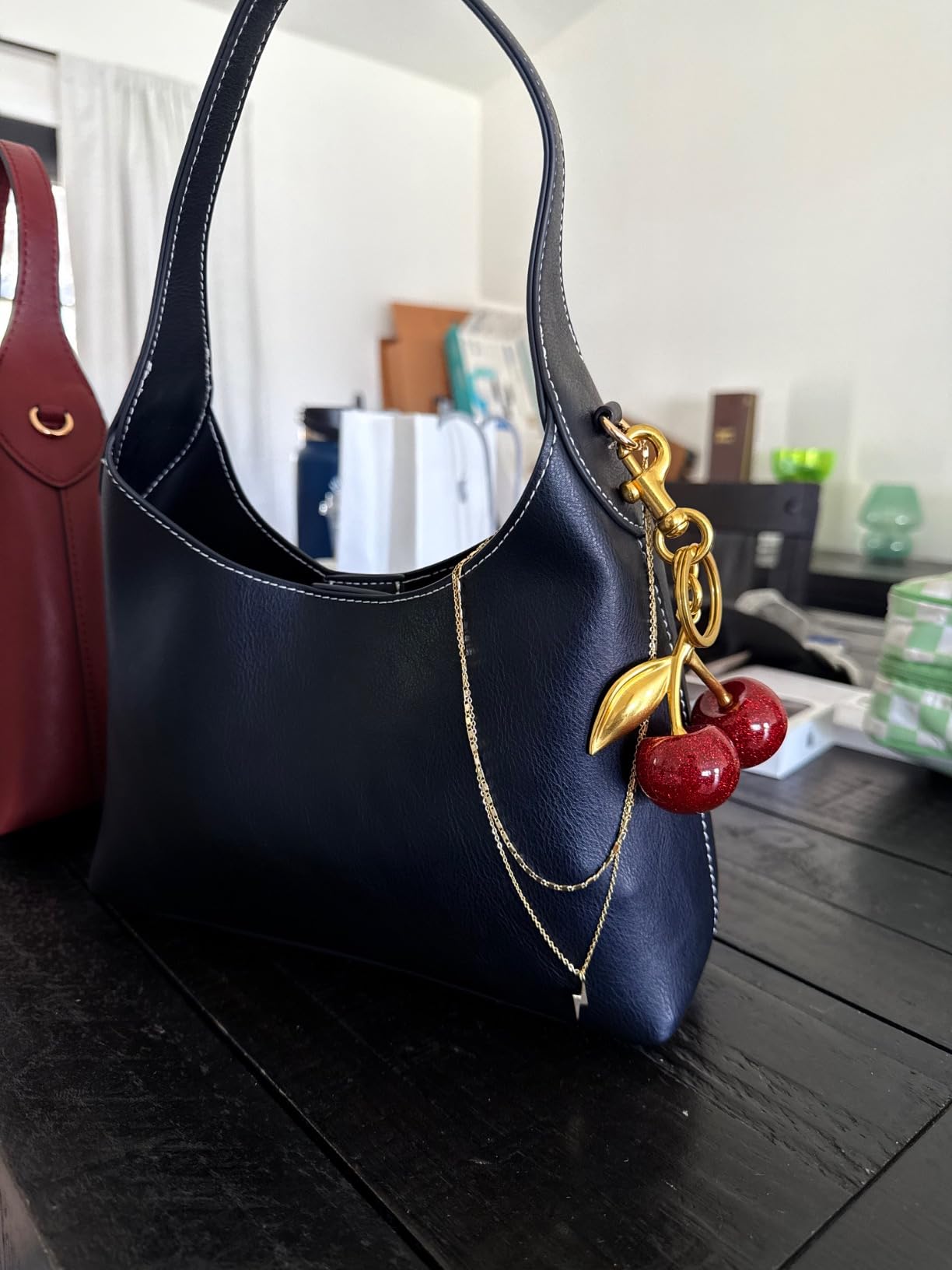 Amelia bag made of artificial leather with a cherry charm